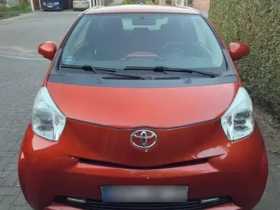 Second-hand Toyota iQ 68 CP (50 kW) 2012 Portocaliu Hatchback