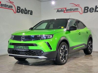 Mamba green met Gebraucht 2021 Opel Mokka-e Ultimate SUV | 15.470 € (Guter Preis)