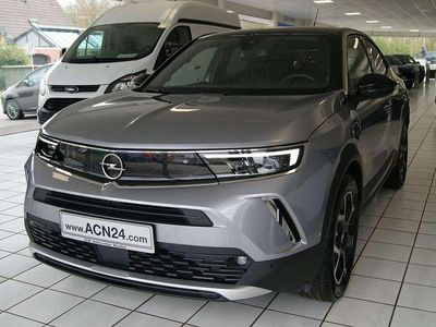 Gebraucht Opel Mokka-e Ultimate 100 kW (136 PS) 2021 Kontrast grau/quarz silber SUV