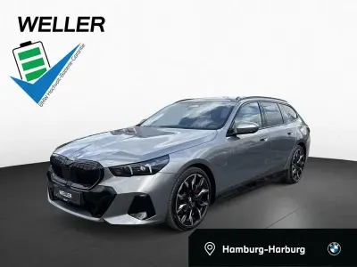 Gebraucht BMW 550e M Sport 489 PS (359 kW) 2025 Oxidgrau (grau) Kombi