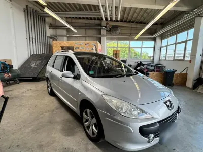 Używany Peugeot 307 140 KM (102 kW) 2006 Srebrny Kombi