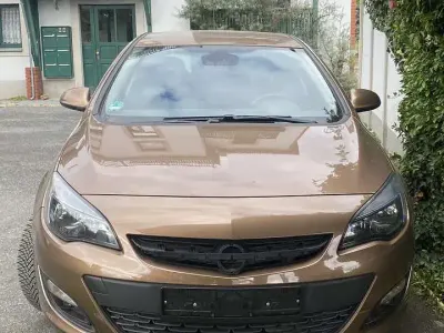 Używany Opel Astra Style 120 KM (88 kW) 2015 Brązowy Hatchback