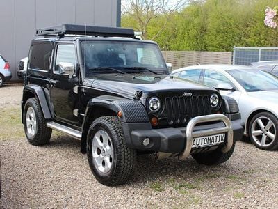 Begagnad Jeep Wrangler Unlimited Sahara 200 HK (147 kW) 2011 Svart SUV
