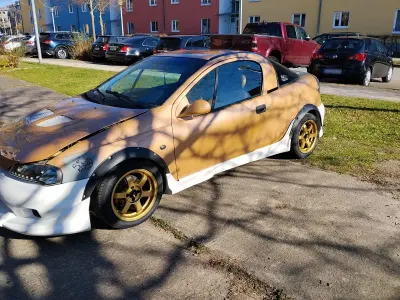 Gebraucht Opel Tigra 106 PS (77 kW) 1996 Gold Coupé