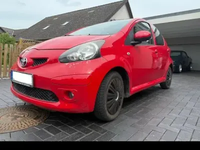 Gebraucht Toyota Aygo 69 PS (50 kW) 2007 Rot Kleinwagen
