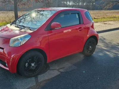 Gebraucht Toyota iQ 98 PS (72 kW) 2010 Rot Kleinwagen