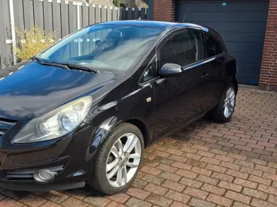 Gebraucht Opel Corsa 80 PS (58 kW) 2010 Schwarz Kleinwagen