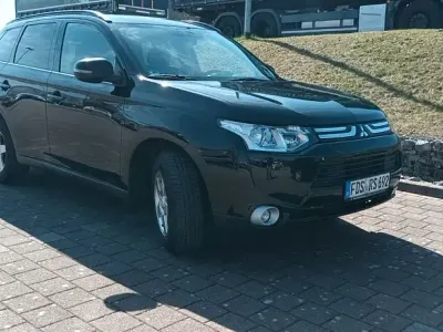 Gebraucht Mitsubishi Outlander Plus 150 PS (110 kW) 2013 Schwarz SUV
