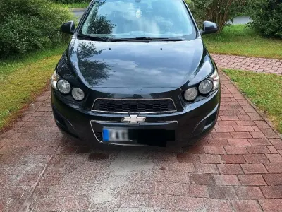 Gebraucht Chevrolet Aveo 95 PS (69 kW) 2012 Schwarz Kleinwagen