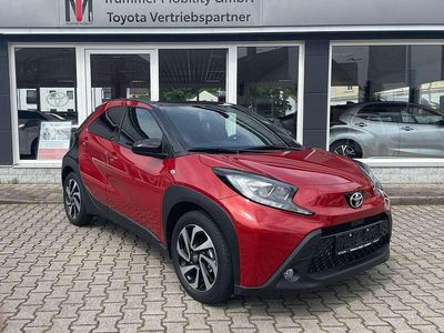 Gebraucht Toyota Aygo Pulse 72 PS (52 kW) 2024 Chili red / black mica Kleinwagen
