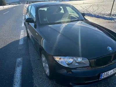 Gebraucht BMW 116 122 PS (89 kW) 2009 Schwarz Kleinwagen