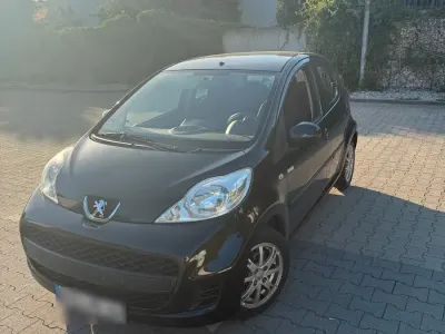 Gebraucht Peugeot 107 68 PS (50 kW) 2010 Schwarz Kleinwagen