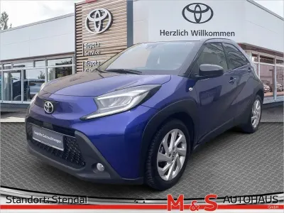 Gebraucht Toyota Aygo X Pulse 72 PS (52 kW) 2022 Juniper blue metallic/ night sky black SUV