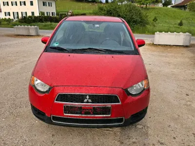 Gebraucht Mitsubishi Colt 75 PS (55 kW) 2011 Rot Kleinwagen