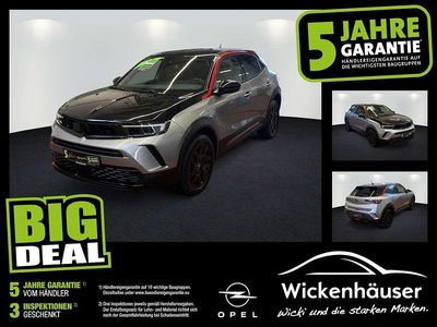Gebraucht Opel Mokka GS Line 131 PS (96 kW) 2023 Kontrast grau/quarz silber SUV