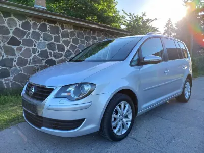 Gebraucht VW Touran Freestyle 105 PS (77 kW) 2009 Reflexsilber metallic Van / Kleinbus