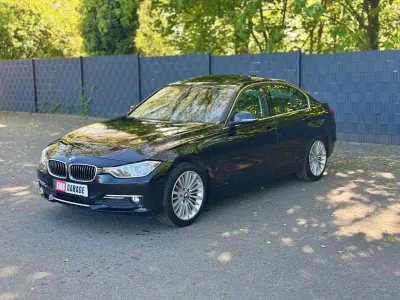 Second-hand BMW 320 Luxury Line 184 CP (135 kW) 2012 Negru Berlinǎ
