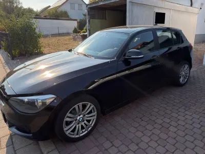Gebraucht BMW 114 102 PS (75 kW) 2012 Schwarz Kleinwagen