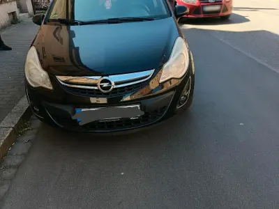 Używany Opel Corsa 87 KM (63 kW) 2012 Czarny Hatchback