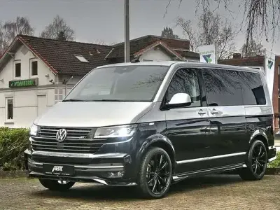Gebraucht VW Multivan Sportline 230 PS (169 kW) 2024 Bicolor reflexsil./starlightbl Van / Kleinbus