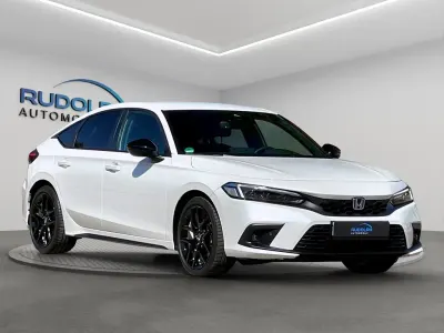 Gebraucht Honda Civic Hybrid 143 PS (105 kW) 2024 Platinum white Limousine