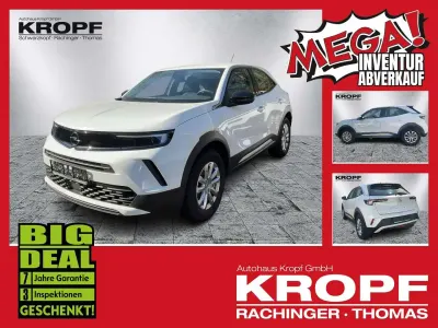 Gebraucht Opel Mokka Enjoy 131 PS (96 kW) 2023 Lack weiss banquise/typ aussen SUV