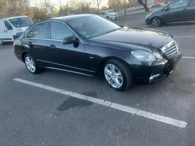 Second-hand Mercedes E250 204 CP (150 kW) 2009 Negru Berlinǎ