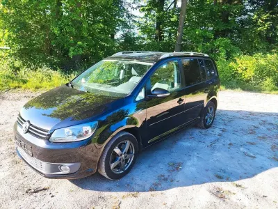Używany VW Touran Life 140 KM (102 kW) 2013 Czarny Minivan