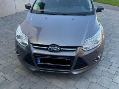 Gebraucht Ford Focus Titanium 116 PS (85 kW) 2014 Braun Kombi
