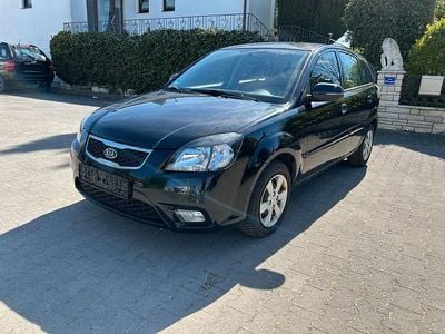 Second-hand Kia Rio Attract 97 CP (71 kW) 2010 Negru Berlinǎ