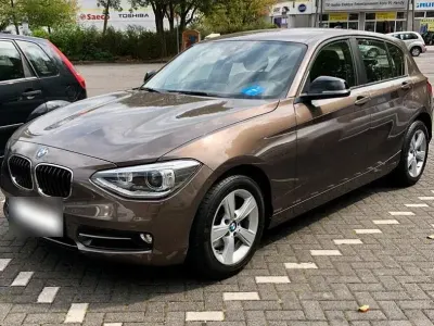 Gebraucht BMW 118 Sport Line 170 PS (125 kW) 2015 Braun Kleinwagen