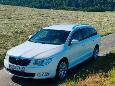 Używany Skoda Superb Ambition 170 KM (125 kW) 2012 Biały Kombi