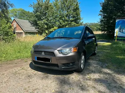 Gebraucht Mitsubishi Colt 95 PS (69 kW) 2012 Braun Kleinwagen