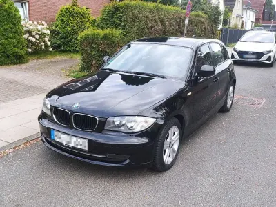 Używany BMW 116 122 KM (89 kW) 2010 Czarny Hatchback