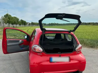 Second-hand Toyota Aygo 69 CP (50 kW) 2009 Roșu Hatchback