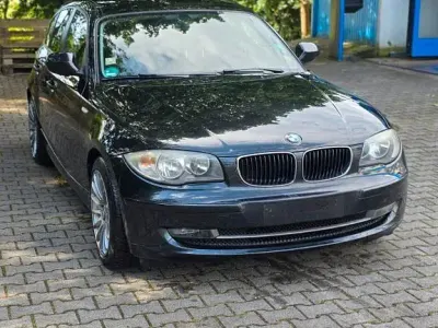 Gebraucht BMW 116 116 PS (85 kW) 2010 Schwarz Kleinwagen