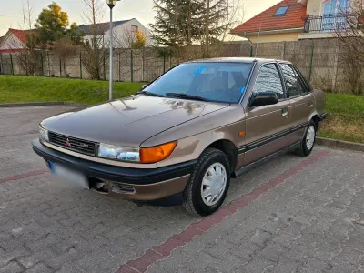 Gebraucht Mitsubishi Lancer 84 PS (61 kW) 1989 Gold Limousine