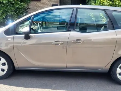 Gebraucht Opel Meriva Edition 101 PS (74 kW) 2010 Braun Van / Kleinbus