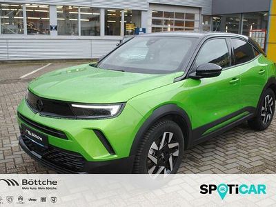 Gebraucht Opel Mokka-e GS Line 100 kW (136 PS) 2023 Lackierung matcha green/typ aussenverkleidung metalliclackierung SUV