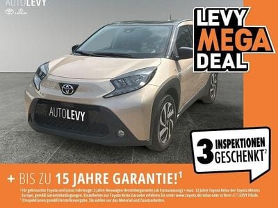 Gebraucht Toyota Aygo Pulse 72 PS (52 kW) 2023 Ginger beige 4u9/ black mica 2 Kleinwagen