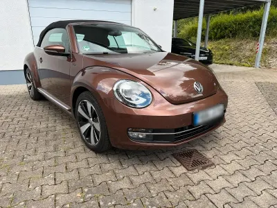 Gebraucht VW Beetle Cabriolet Allstar 125 PS (91 kW) 2016 Braun Cabrio