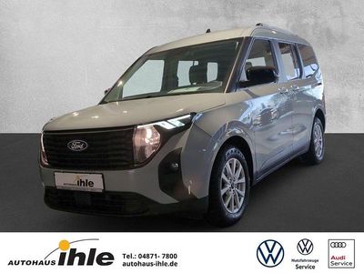 Grau Gebraucht 2024 Ford Tourneo Courier Titanium Van / Kleinbus | 25.490 € (Fairer Preis)