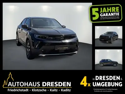 Gebraucht Opel Mokka-e Elegance 100 kW (136 PS) 2022 Diamant schwarz SUV