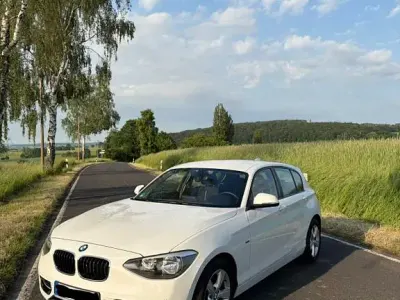Gebraucht BMW 116 Sport Line 136 PS (100 kW) 2011 Weiß Kleinwagen