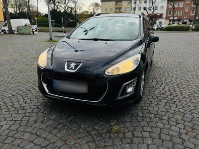 Gebraucht Peugeot 308 SW 105 PS (77 kW) 2011 Schwarz Kombi