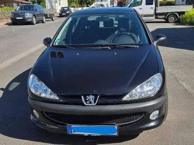 Używany Peugeot 206 Filou 75 KM (55 kW) 2009 Czarny Sedan/Limuzyna