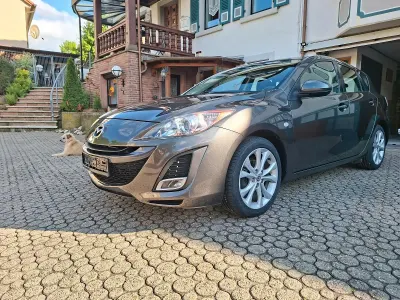 Używany Mazda 3 105 KM (77 kW) 2011 Szary Sedan/Limuzyna