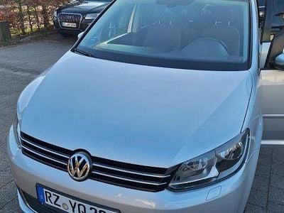 Second-hand VW Touran 105 CP (77 kW) 2011 Argintiu Monovolum