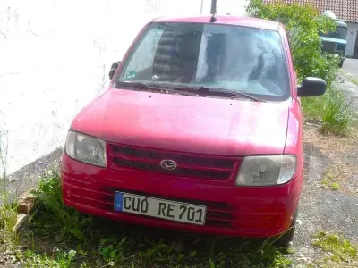 Gebraucht Daihatsu Cuore Plus 56 PS (41 kW) 1998 Rot Kleinwagen