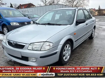 Brugt Mazda 323 Comfort 88 HK (64 kW) 1998 Sølv Sedan